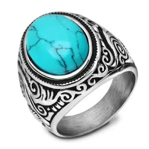 Vintage ring met retro turquoise accenten.